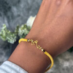 RAKHI ( 9KT GOLD)